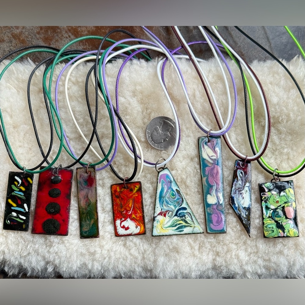 8 vintage (60’s) copper and enamel pendants 1.75-2.75” long. Beautiful patterns